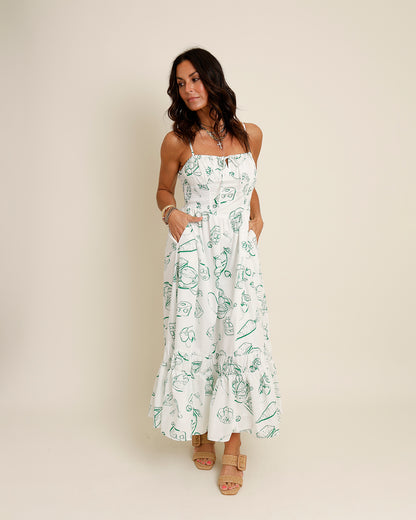green and white printed midi dress
