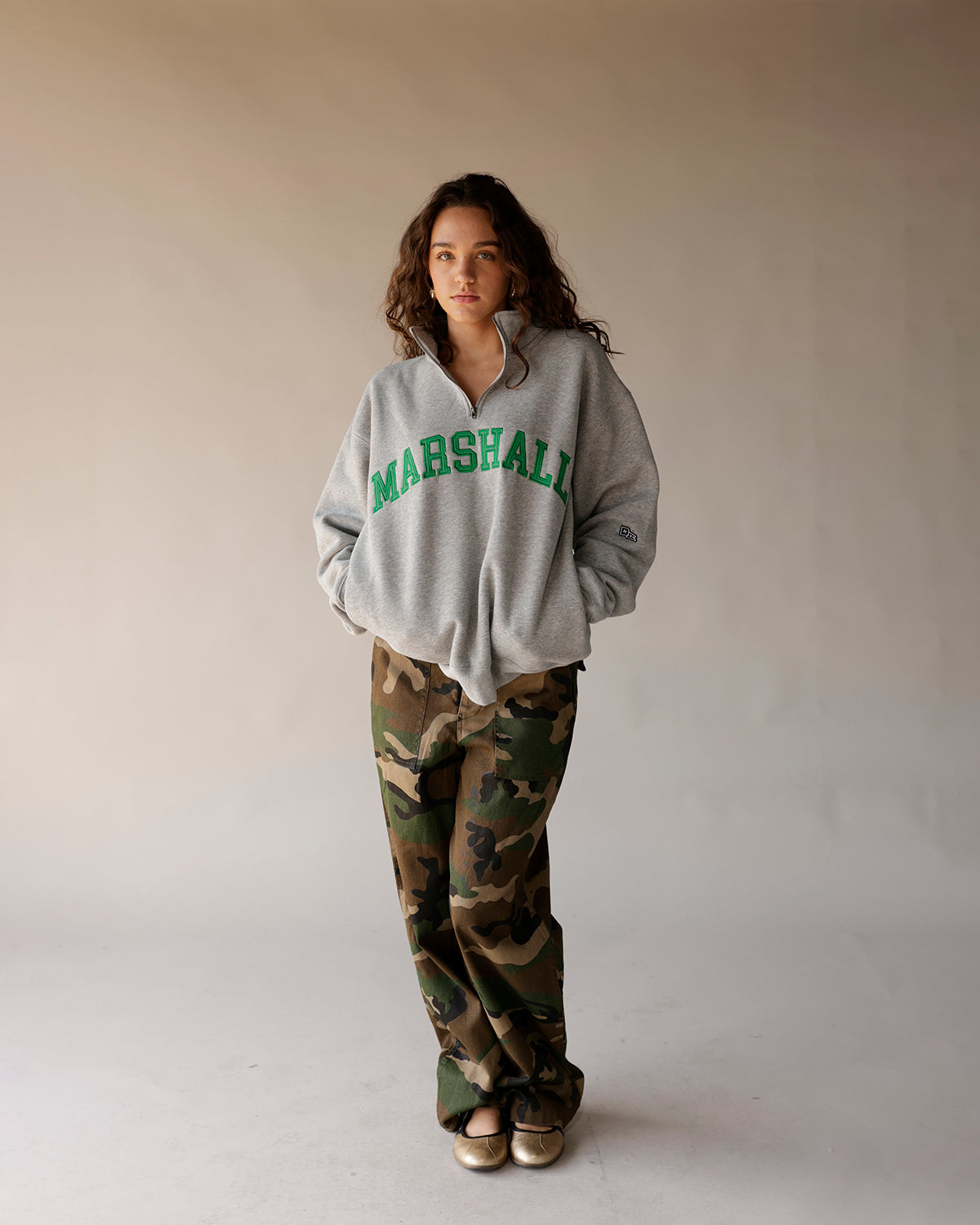 Gray Marshall quarter-zip sweatshirt with green collegiate lettering, oversized fit