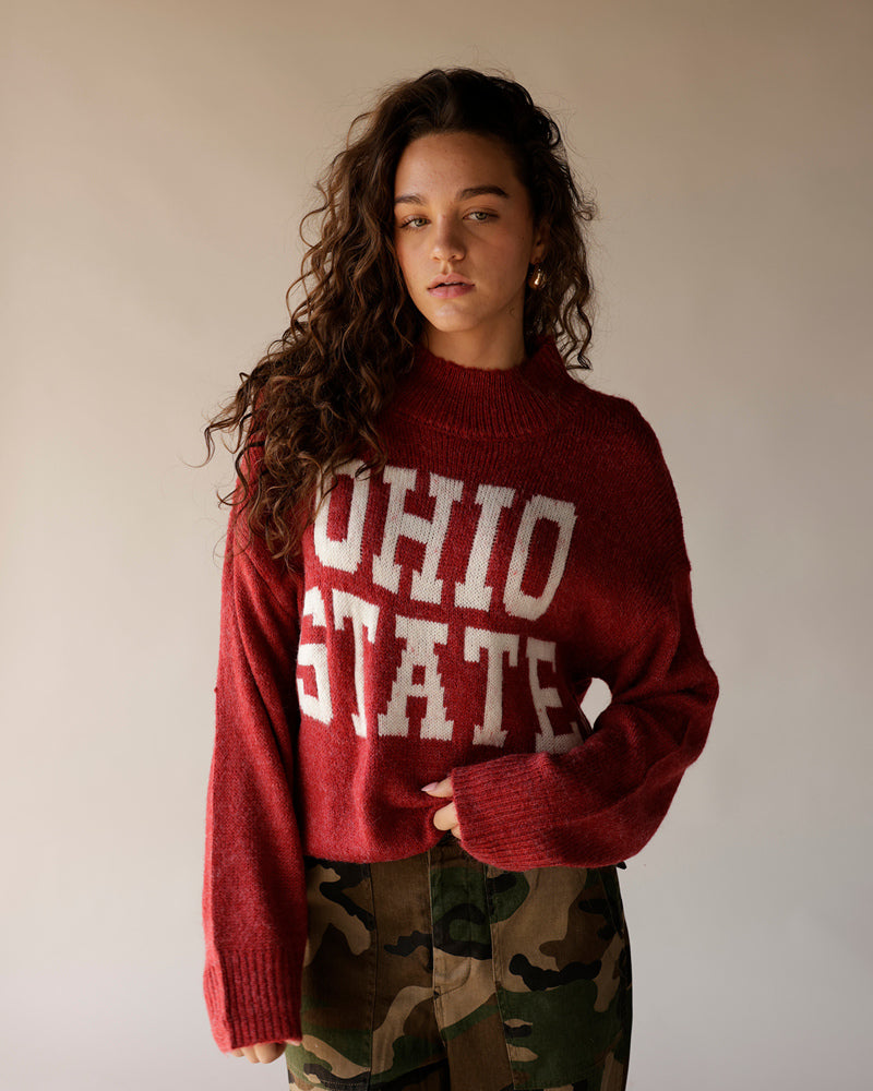 Cropped red Ohio State knit sweater with white block letters, mock neck
