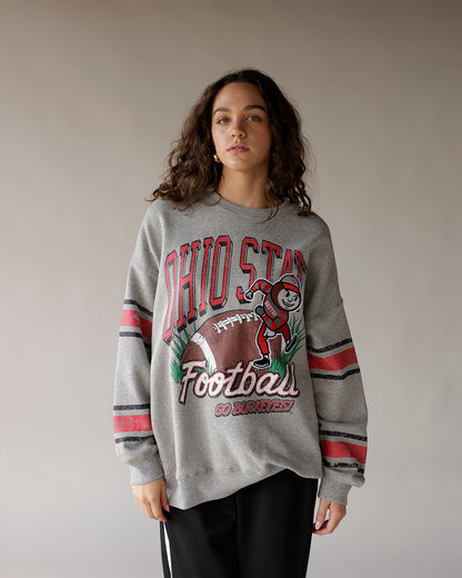 Gray Ohio State Football throwback crewneck sweatshirt with striped sleeves and Brutus mascot graphic