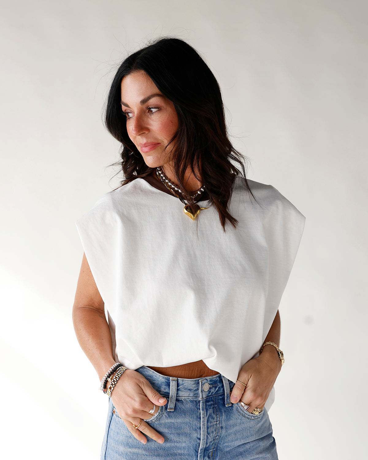 white muscle tee with brown shoulder stripes