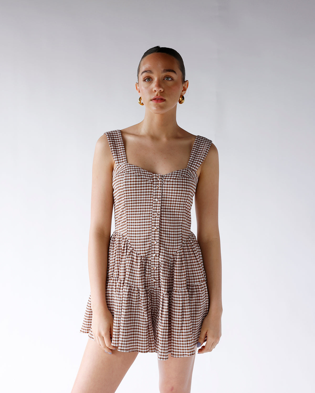 brown gingham print tiered ruffle skirt romper with adjustable straps