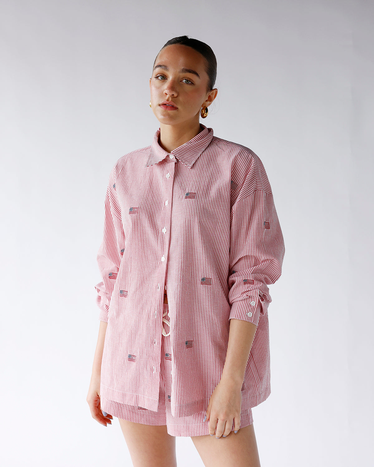 red and white striped button up with embroidered american flags