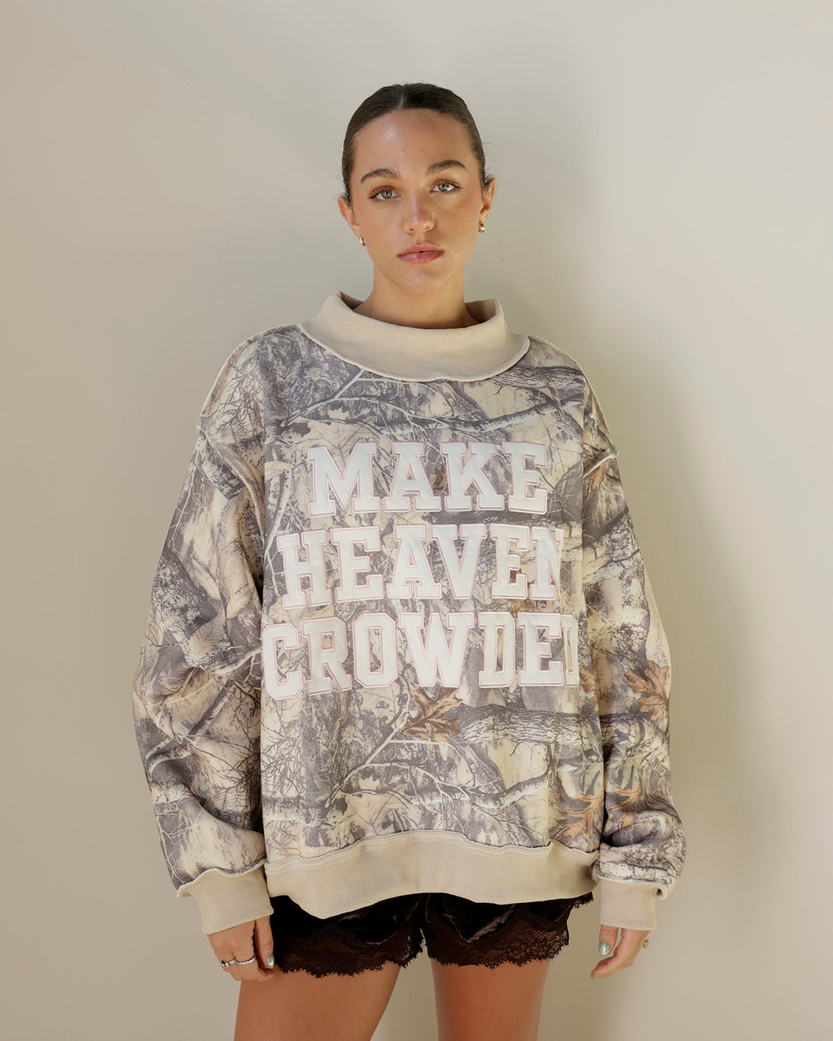 MAKE HEAVEN CROWDED CAMO MOCK NECK SWEATSHIRT