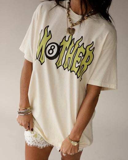 Cream oversized graphic tee with flaming MOTHER 8-ball logo print