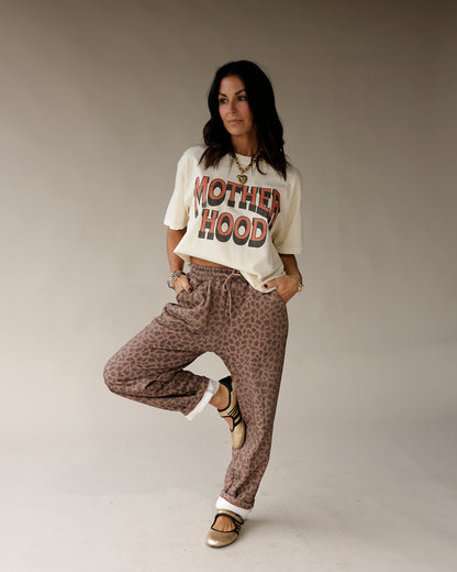 Cream vintage graphic tee with bold red and black MOTHERHOOD text print