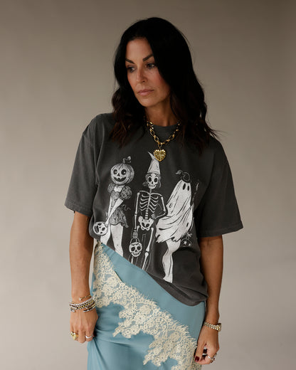 Dark gray oversized graphic tee with vintage Halloween skeleton, ghost, and pumpkin print