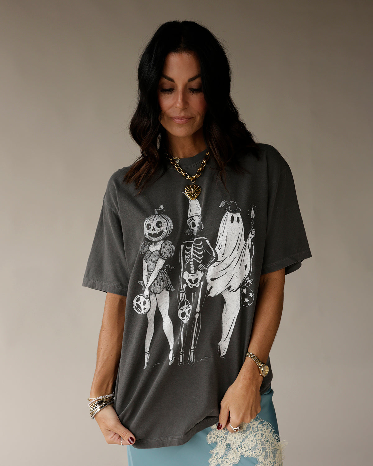 Charcoal gray oversized Halloween graphic tee with pumpkin skeleton ghost pin-up print