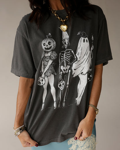 Charcoal gray oversized graphic tee with Halloween pumpkin skeleton ghost trio print