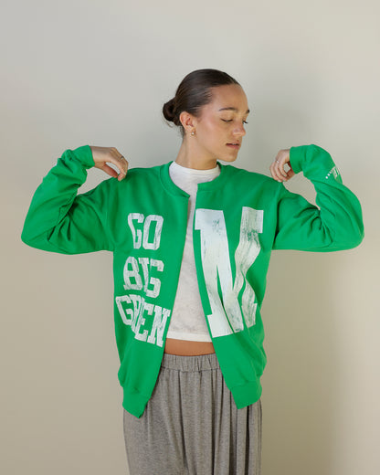 kelly green marshall university open-front sweatshirt cardigan with distressed white go big green varsity lettering, oversized M graphic and ribbed cuffs.