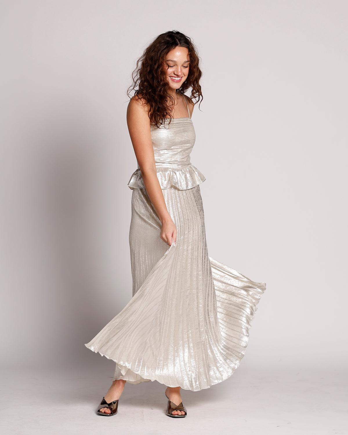 LUNAR GLOW PEPLUM PLEATED MAXI DRESS