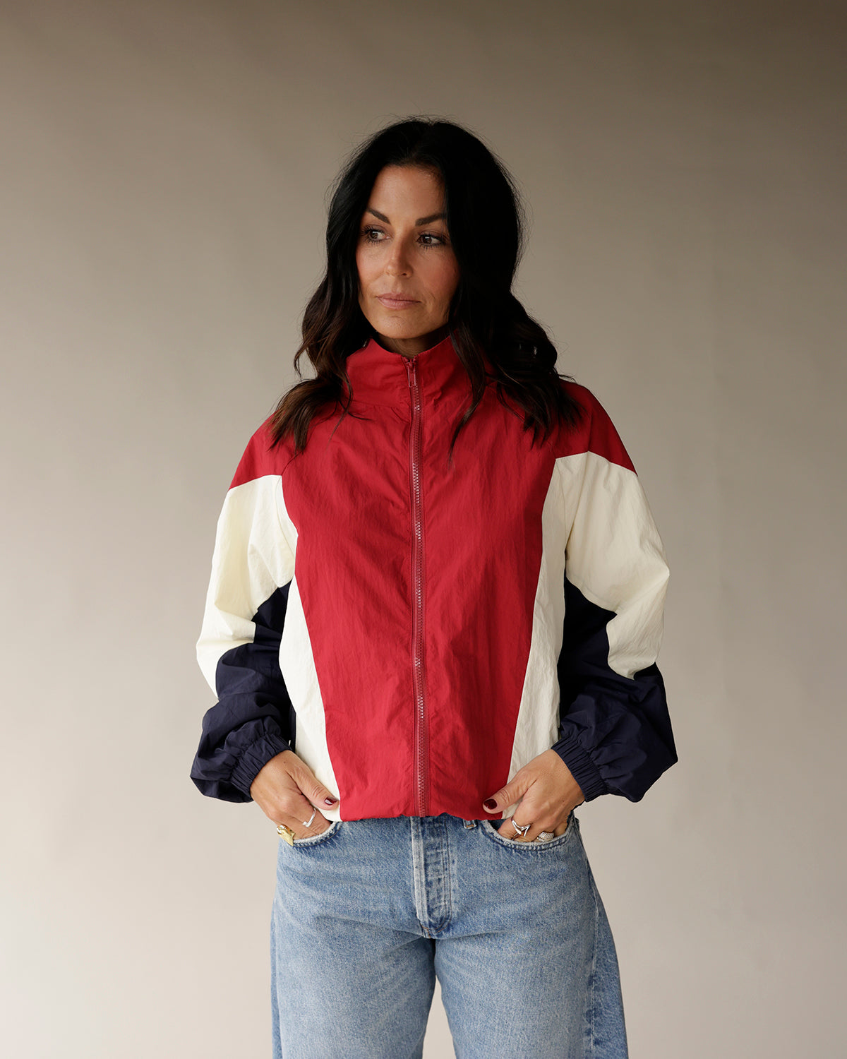 Red, cream, and navy colorblock zip-up windbreaker jacket with mock neck