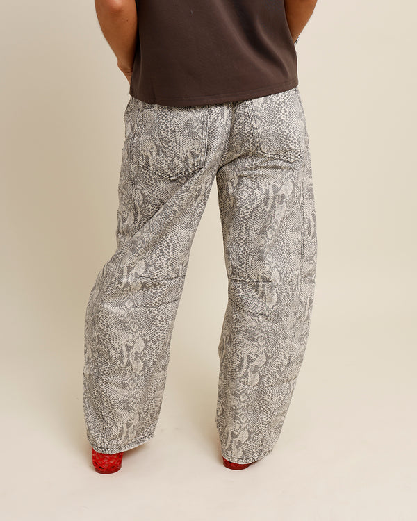 FREE PEOPLE GOOD LUCK SNAKE PRINT BARREL JEANS