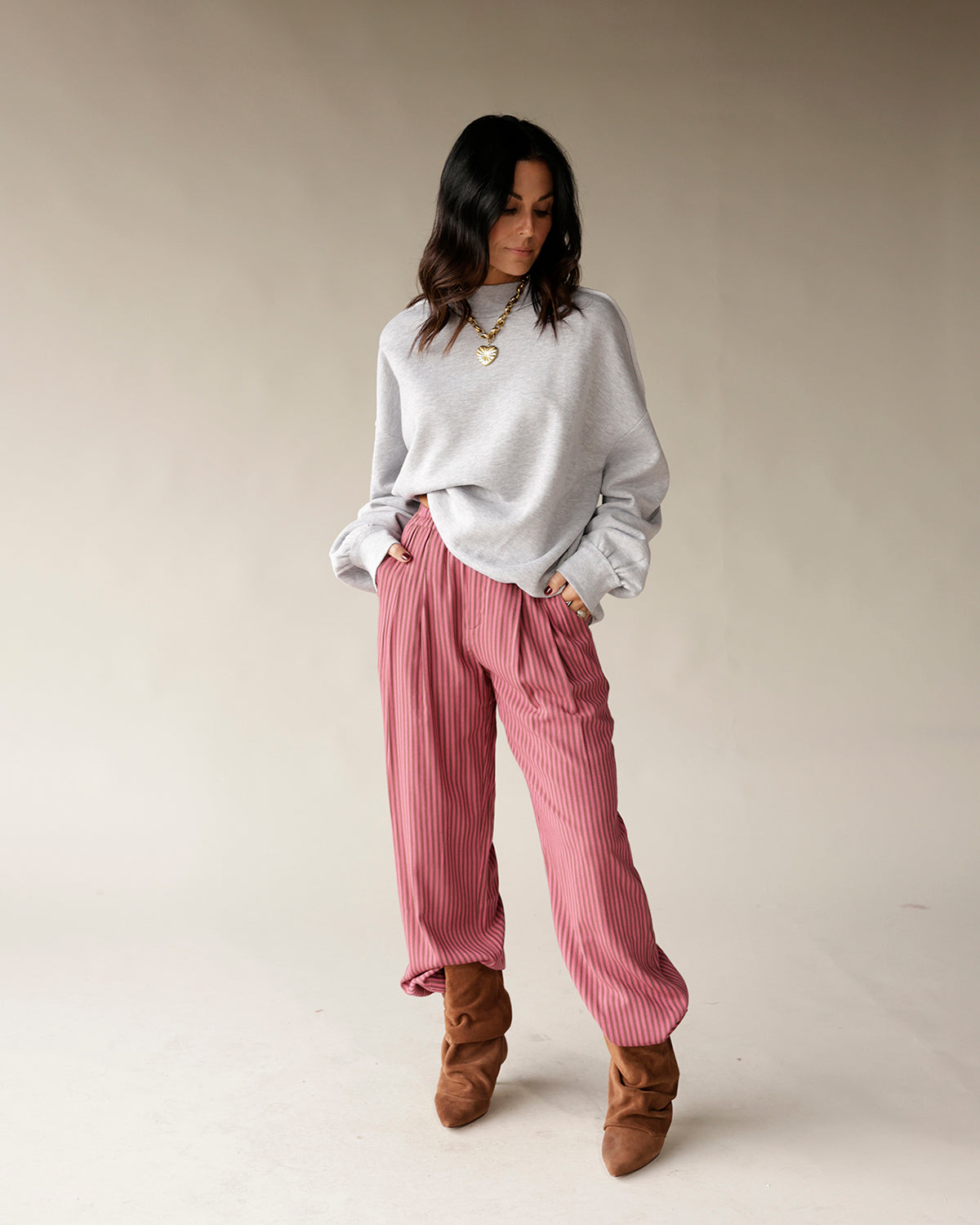 Pink striped wide-leg dressy pants with pleated high waist and relaxed fit