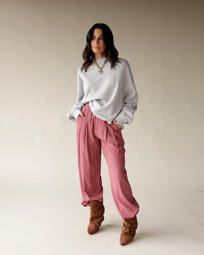 Pink striped wide-leg dressy pants with pleated front and relaxed silhouette