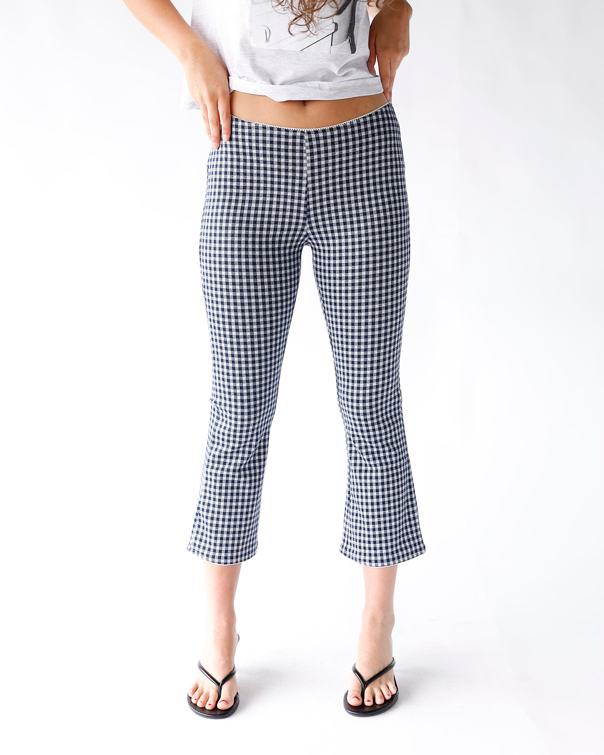 navy blue and white gingham print flared capri pants