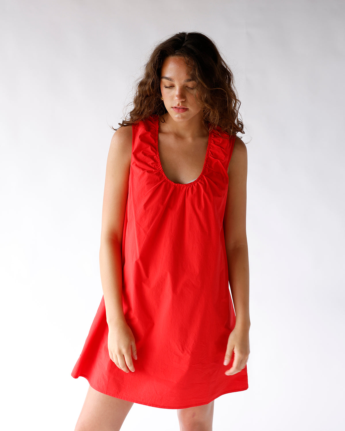 red sleeveless scoop neck mini dress