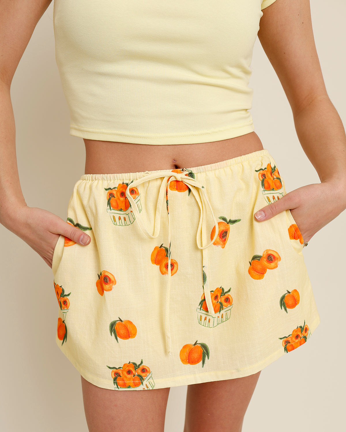 yellow peach print mini skirt 