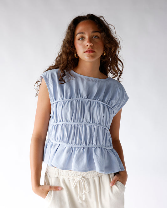 light blue tiered detailing peplum top