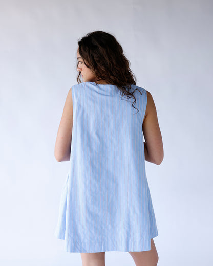 Women's sleeveless light blue striped mini dress, A-line fit, back view