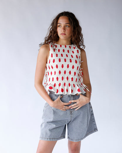 RED CONFETTI SLEEVELESS BLOUSE