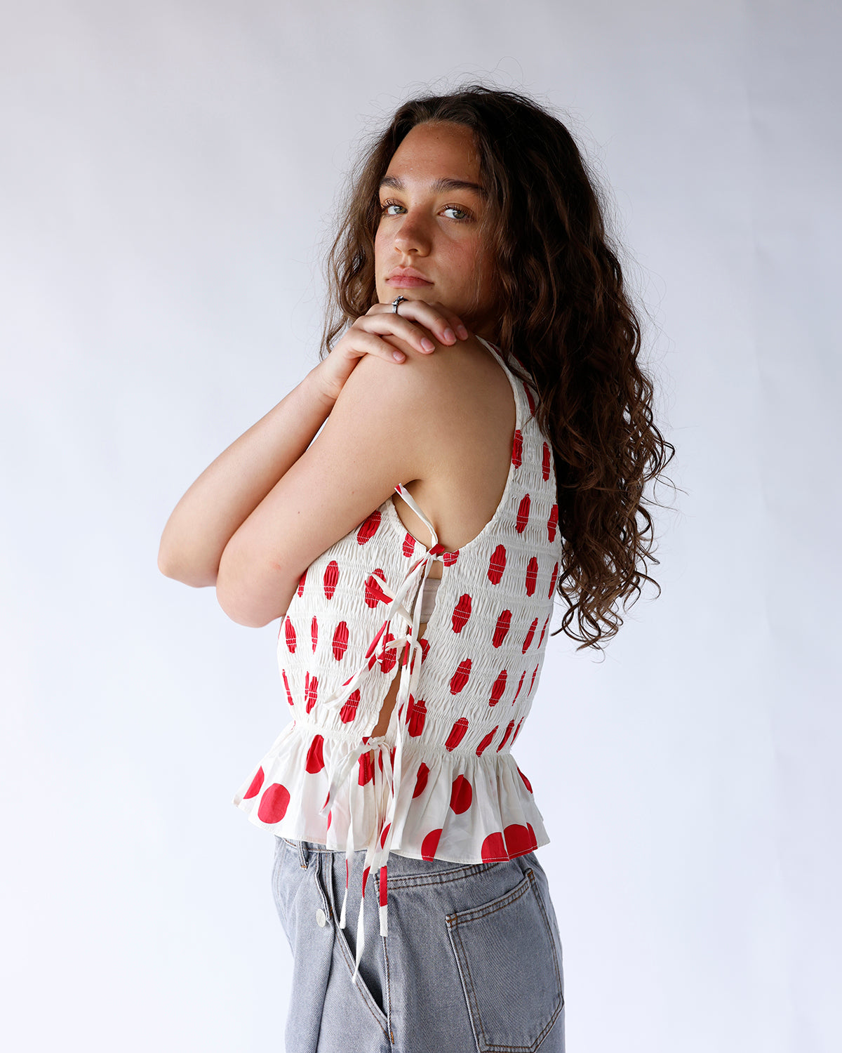 RED CONFETTI SLEEVELESS BLOUSE