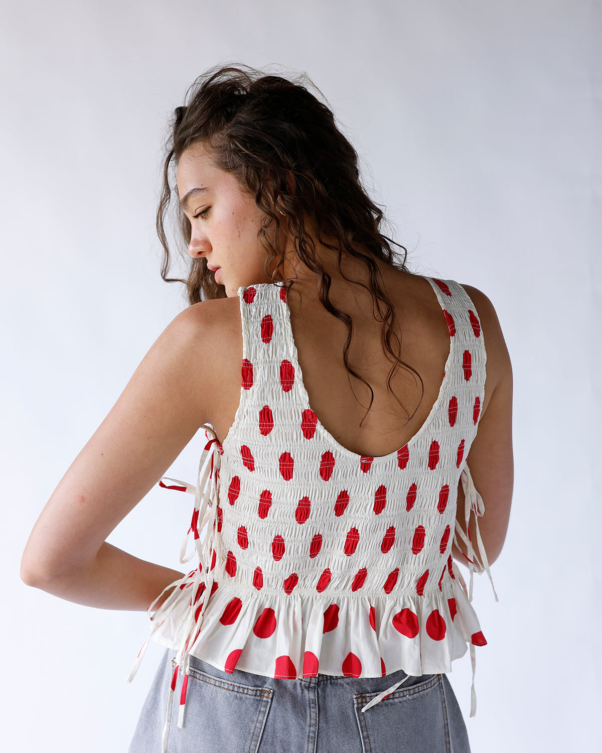 RED CONFETTI SLEEVELESS BLOUSE