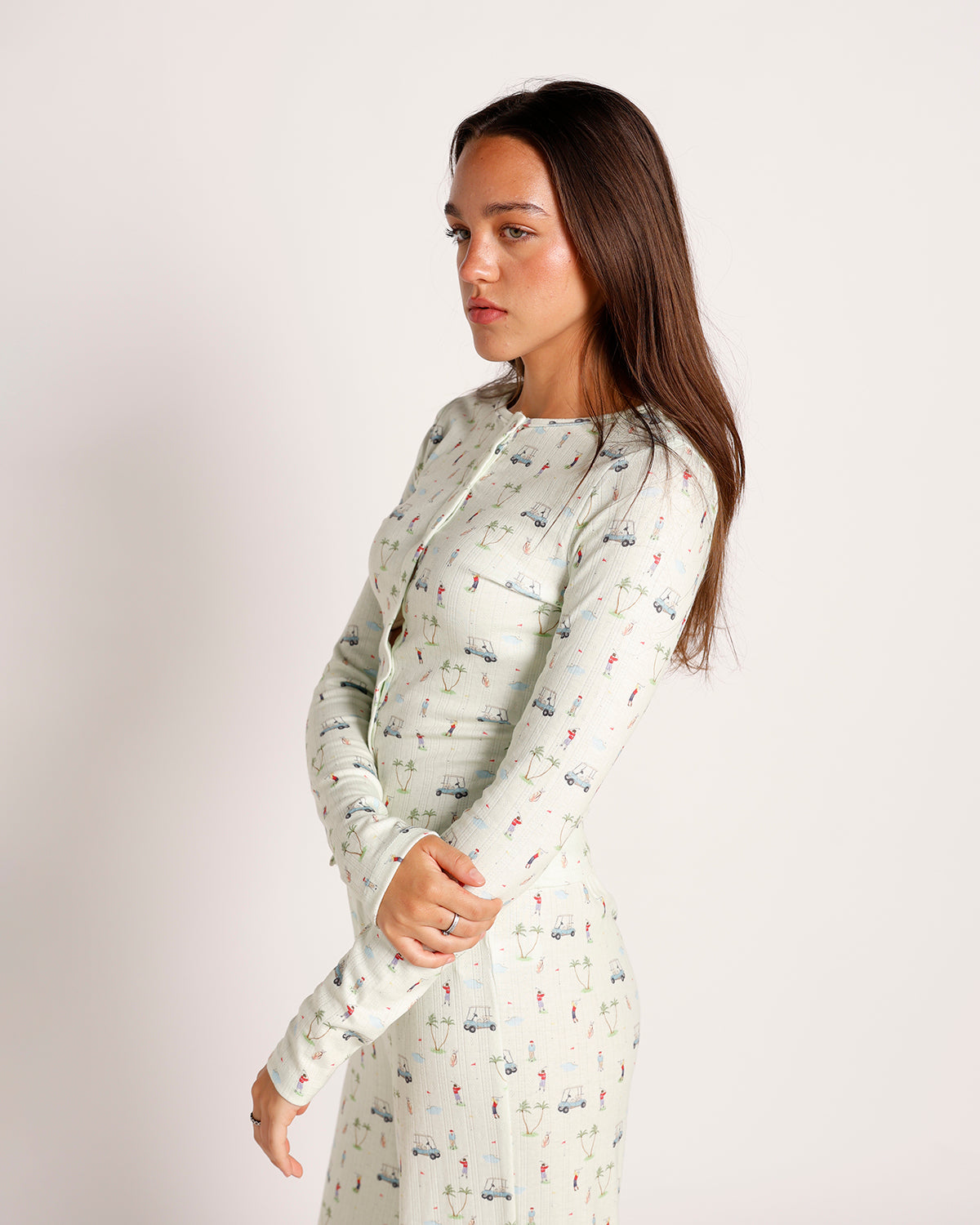 Women's long sleeve ribbed midi dress in mint green golf novelty print