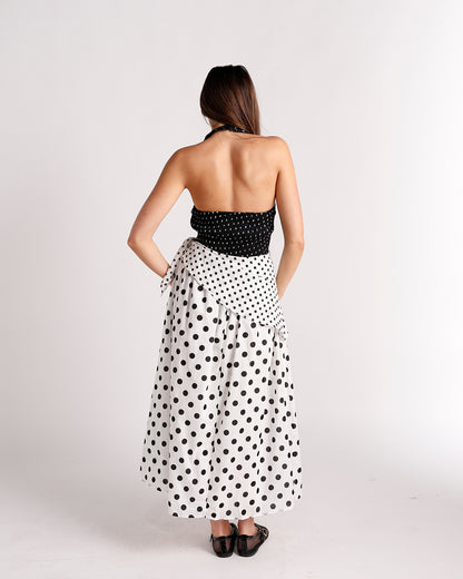 Black and white polka dot halter midi dress with open back and bow detail