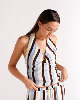 Striped halter crop top in blue, cream, and brown with ruched front detail