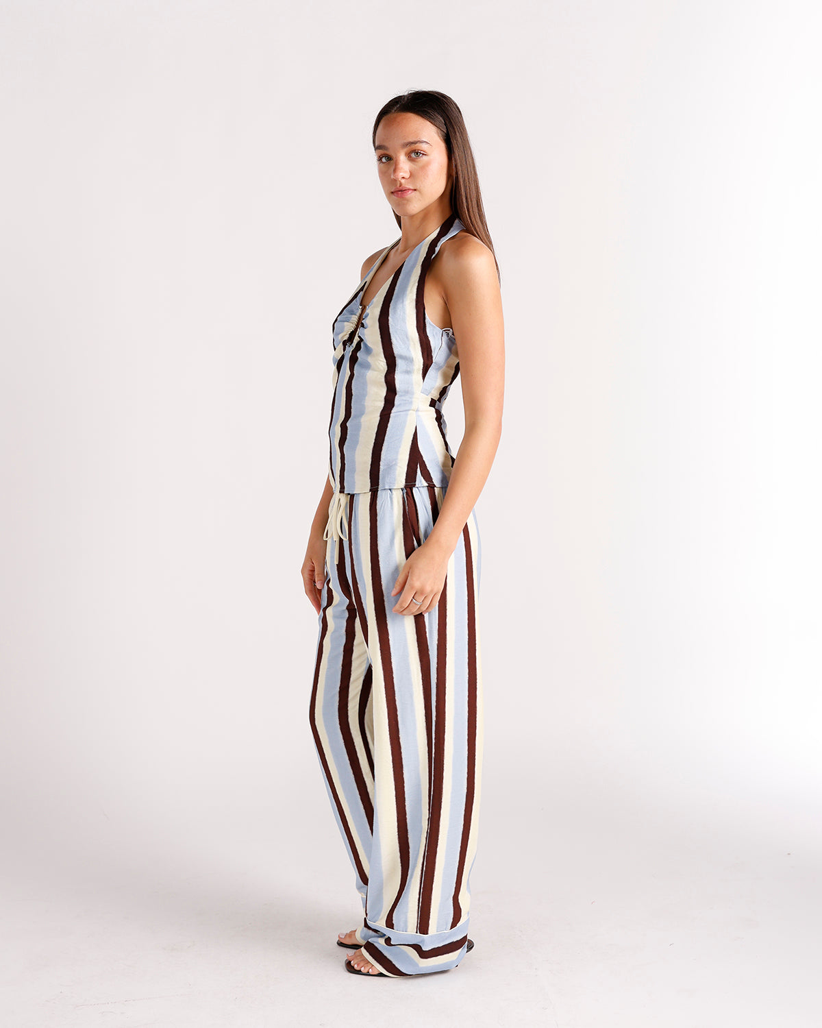 Wide-leg striped dressy pants in blue, cream, and brown with drawstring waist