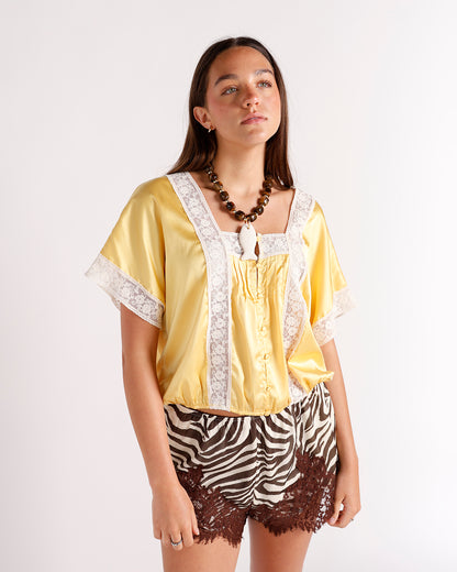 Zebra print satin shorts with brown lace trim hem, brown and cream pattern