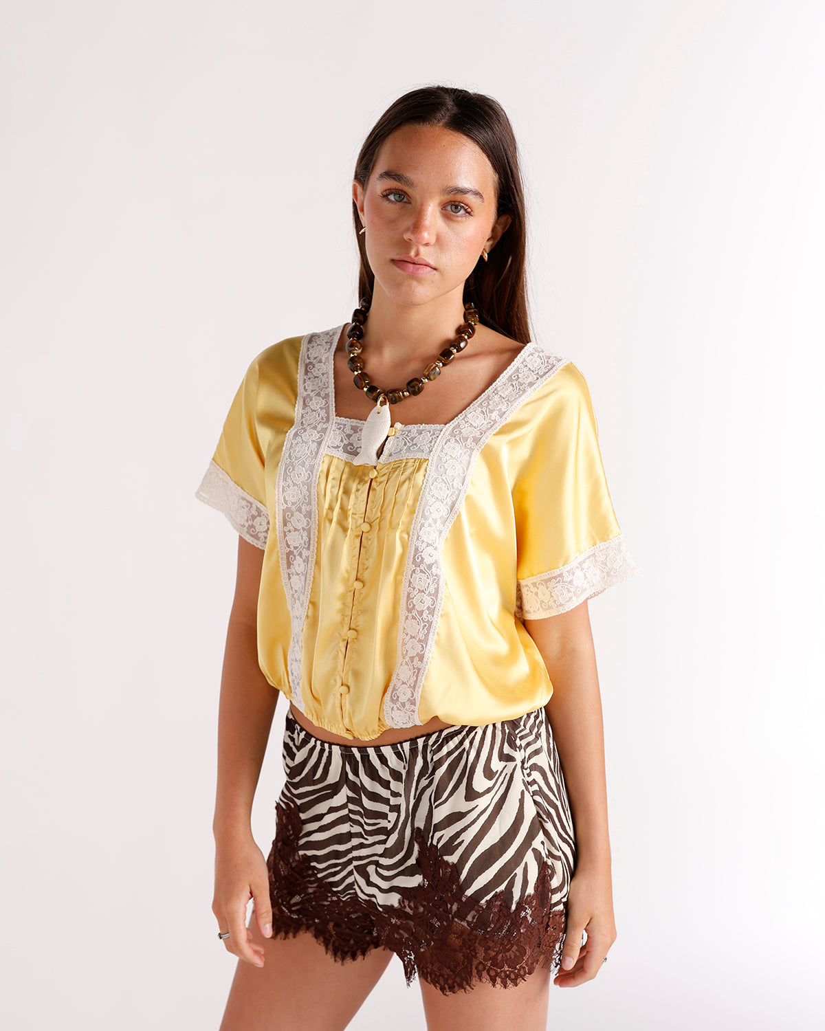 yellow short sleeve button front blouse with lace inset detailing