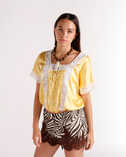 Zebra print satin shorts with dark brown lace trim hem