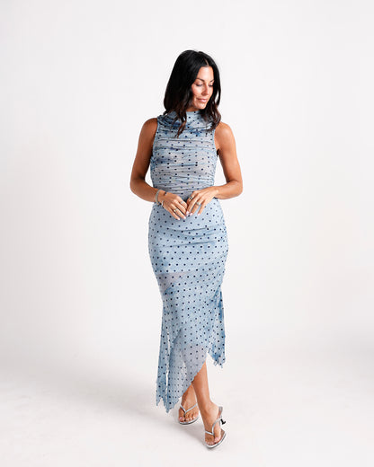 Blue polka dot ruched mesh midi dress with high neck and asymmetric hem