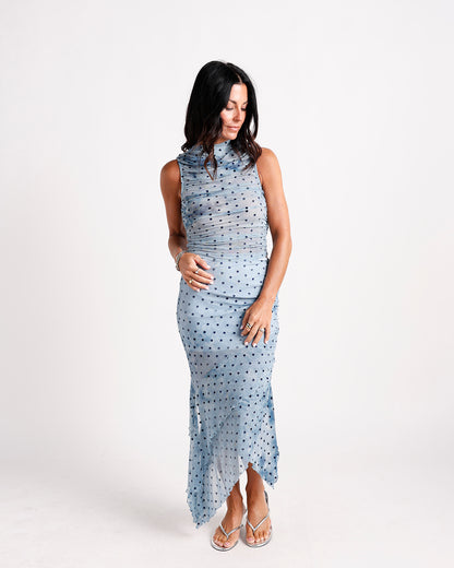 Blue polka dot ruched mesh midi dress with high neck and ruffle hem