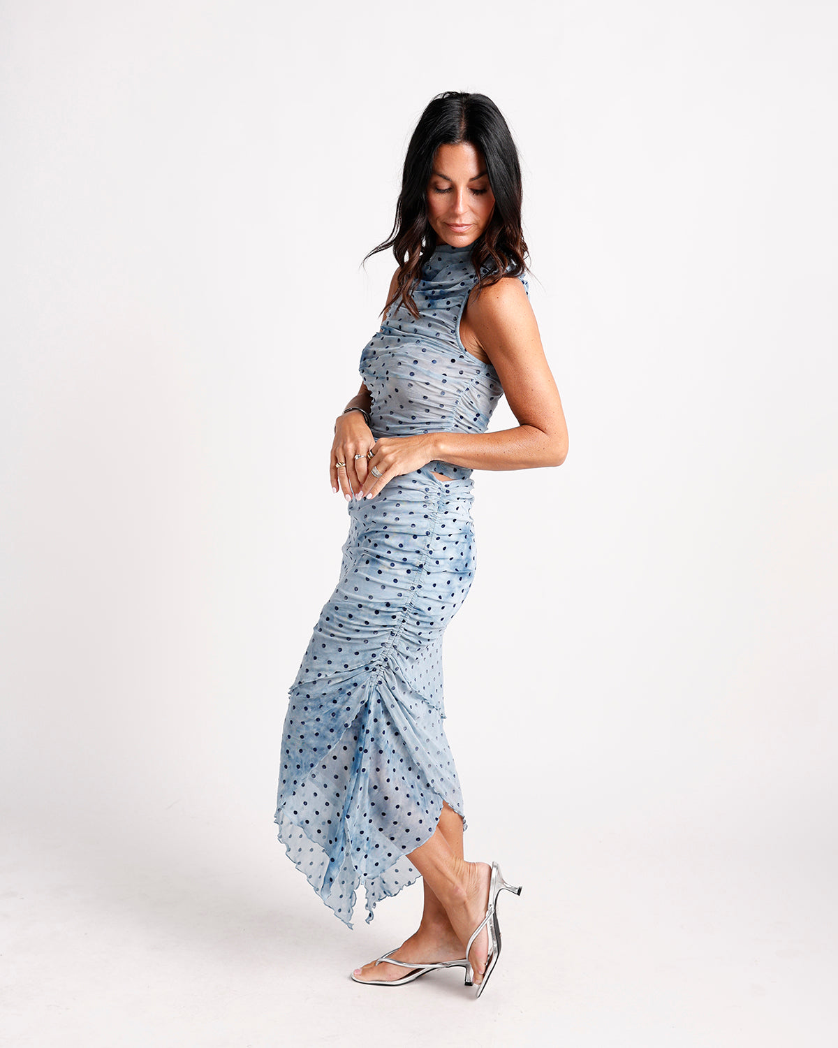 Blue polka dot ruched mesh midi dress with mock neck and cutout detail