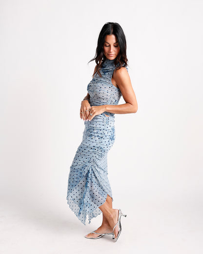 Blue polka dot ruched mesh midi dress with mock neck and cutout detail