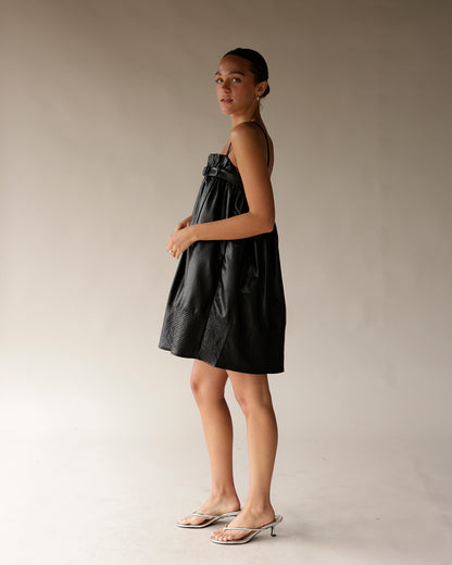 BOW LOVE FAUX LEATHER BLACK MINI DRESS