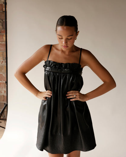 BOW LOVE FAUX LEATHER BLACK MINI DRESS