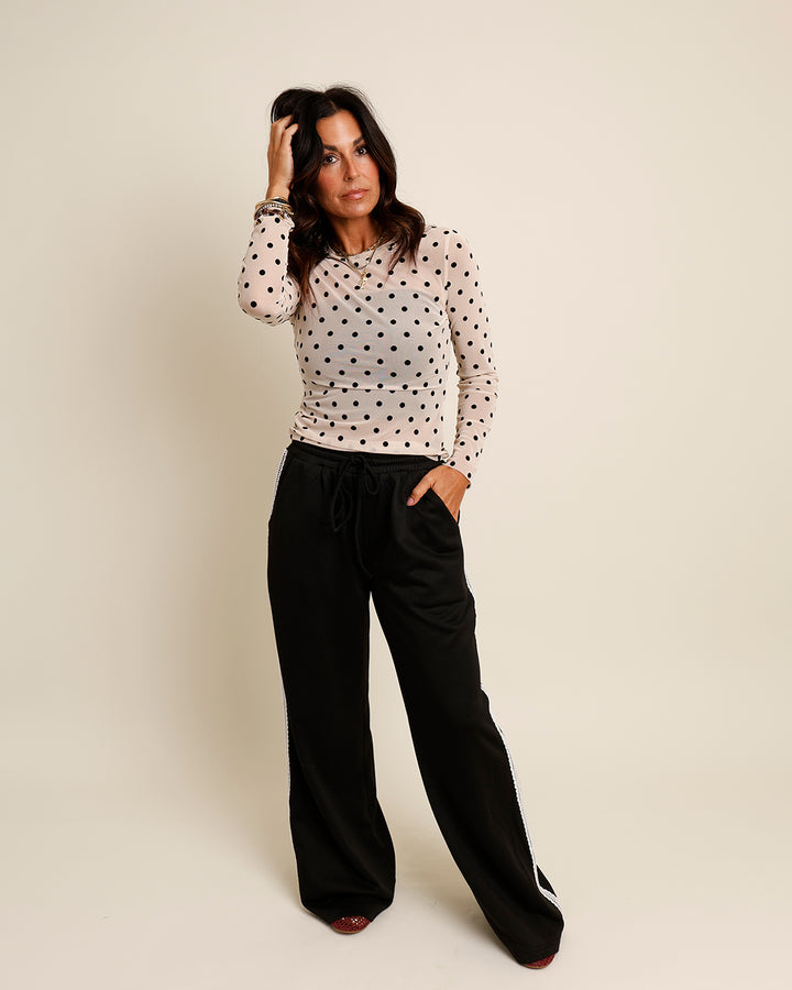 DOT(ING) ON HER SHEER TOP