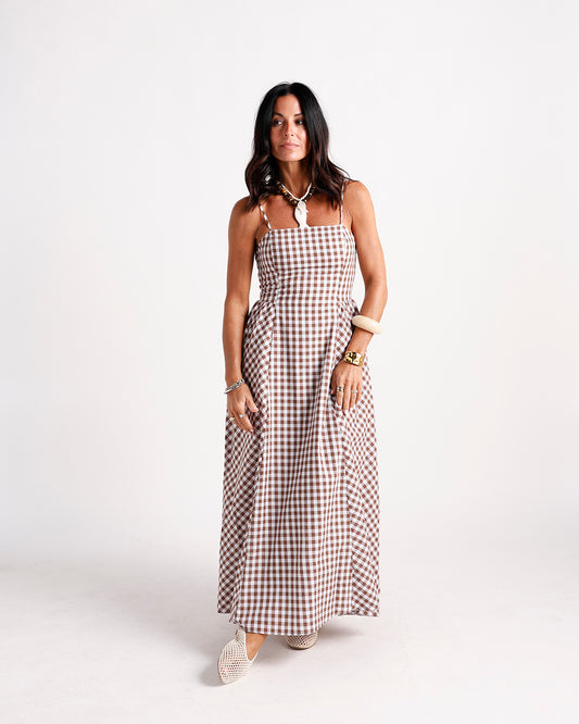 Brown and white gingham maxi dress with spaghetti straps and fitted bodice