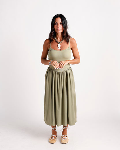Olive green drop waist midi dress with spaghetti straps and gathered skirt