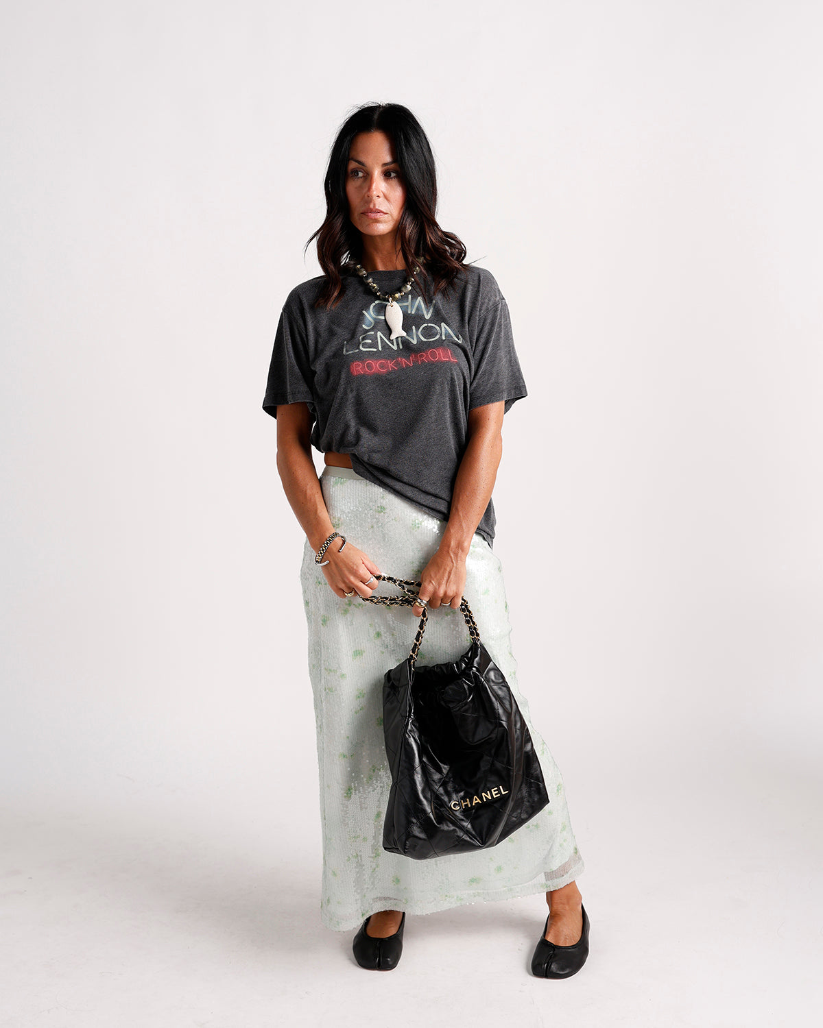 Charcoal gray graphic band tee with faded rock print, short sleeves, relaxed fit
