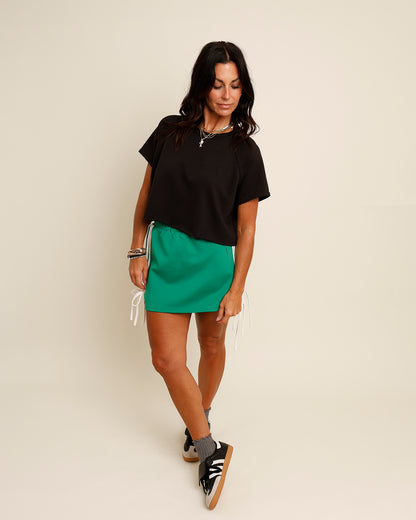 ON THE RUN MINI SKIRT X GREEN