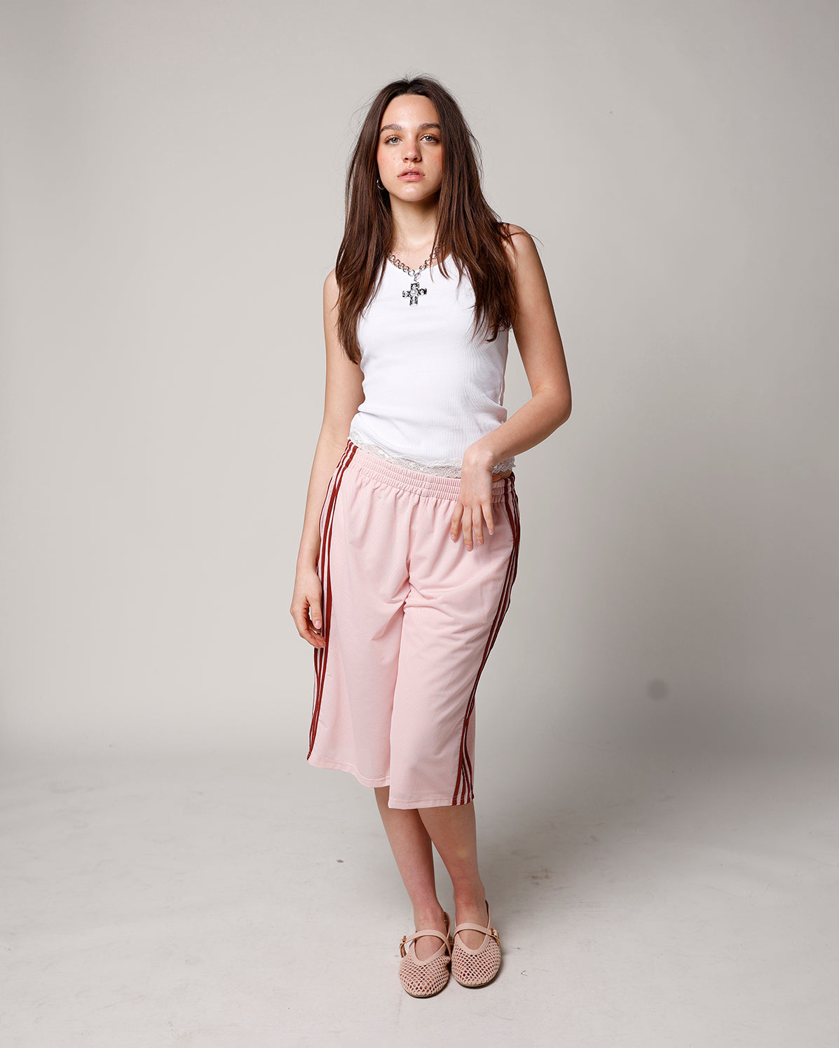 BLUSH LONGLINE MESH TRACK SHORT