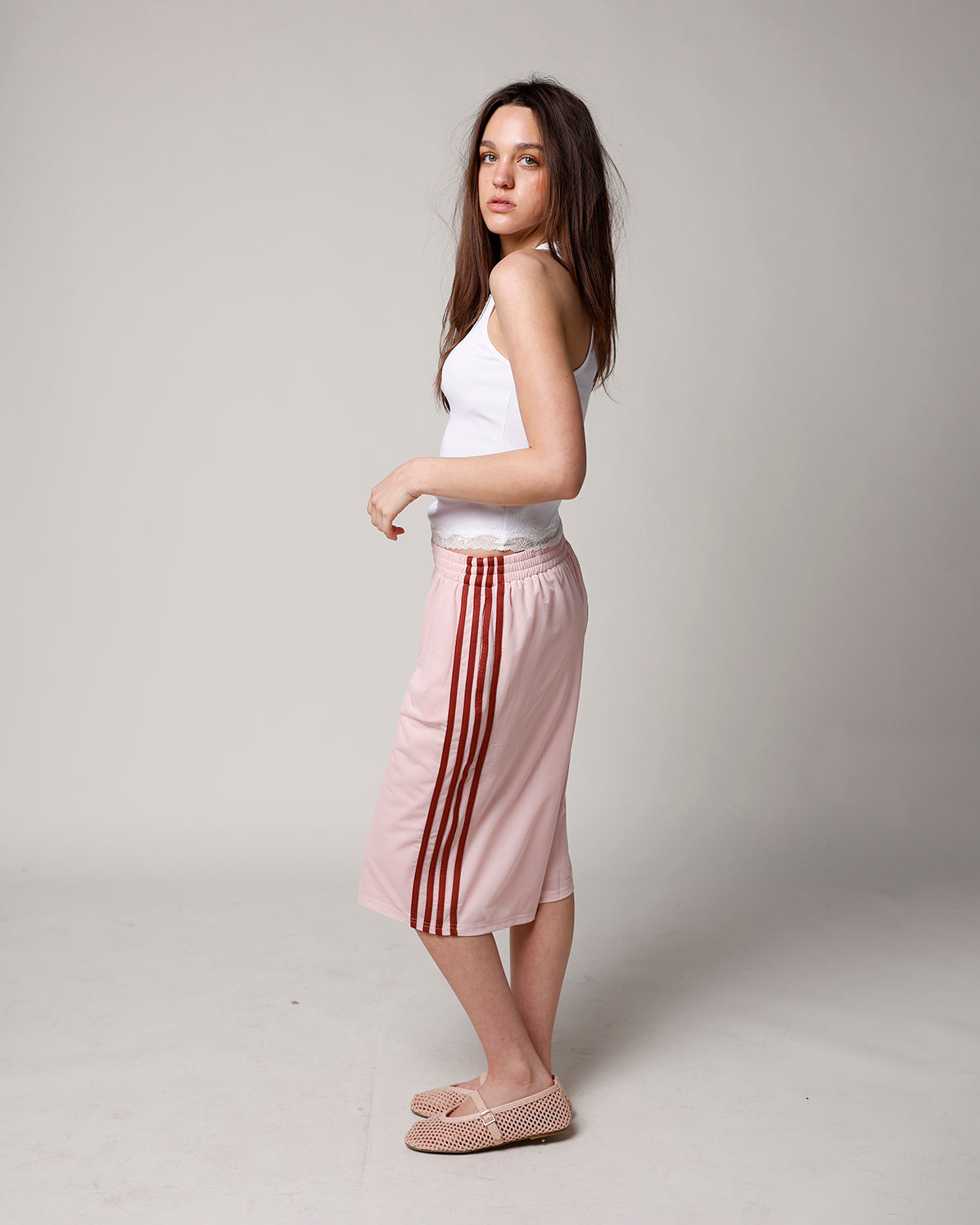 BLUSH LONGLINE MESH TRACK SHORT