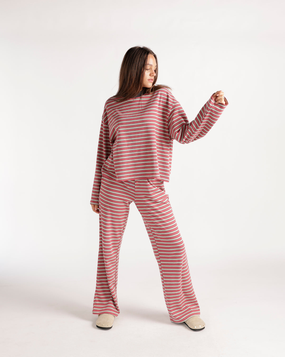 Pink and gray striped wide-leg lounge pants with elastic waistband