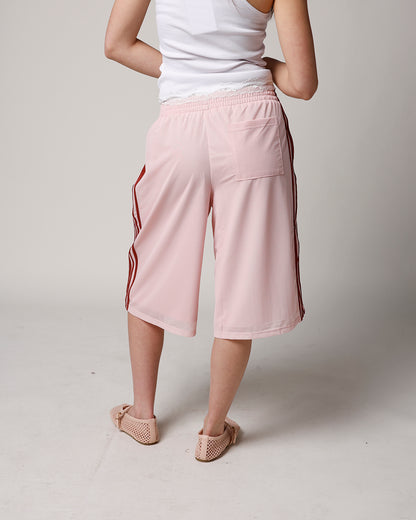 BLUSH LONGLINE MESH TRACK SHORT