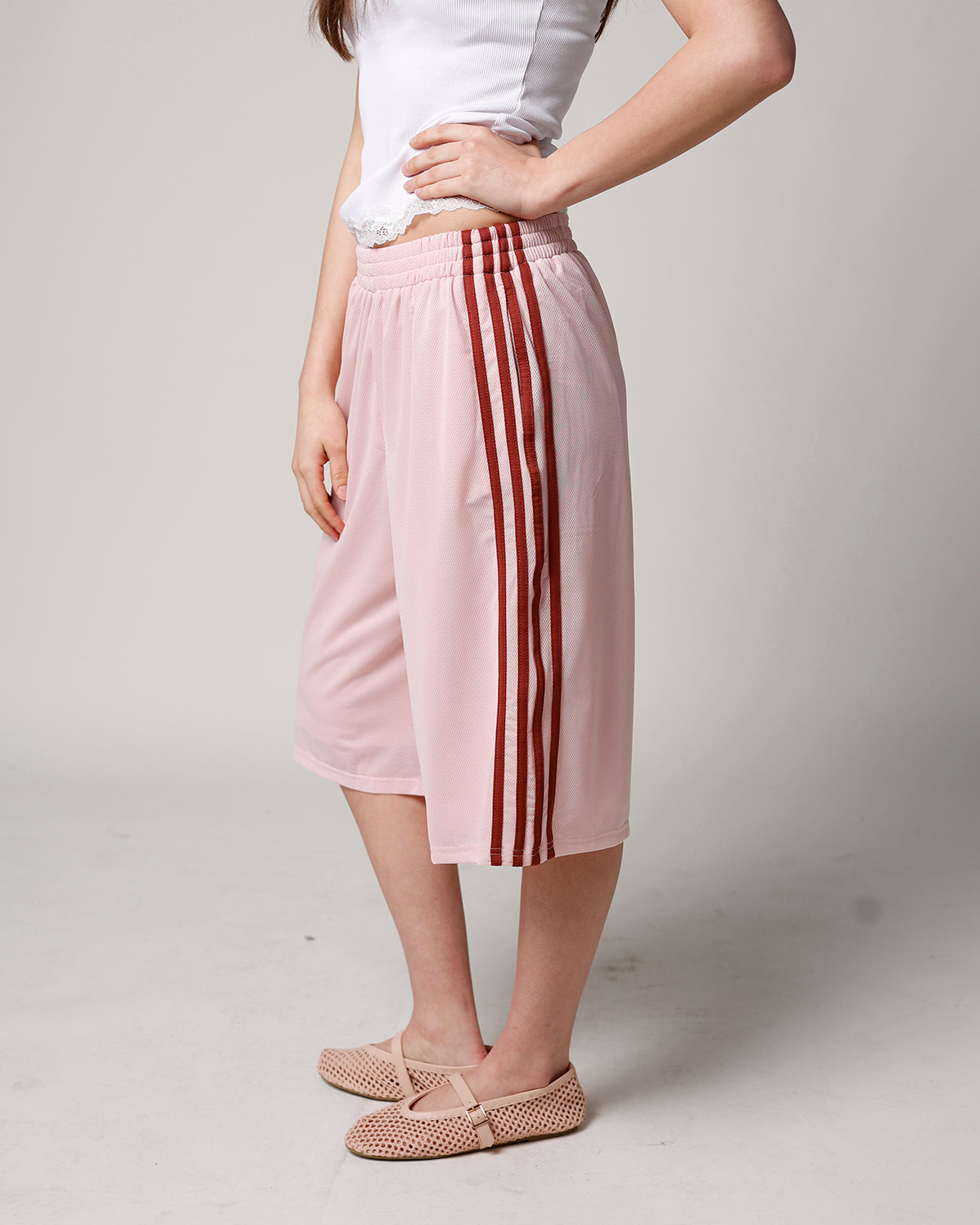 BLUSH LONGLINE MESH TRACK SHORT